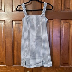 Dress with small double slots in front